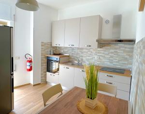 IDOLO MORESCO Apartments - spacious & charming holiday homes in the heart of Nettuno, just a few meters from the sea, beaches and train station, with hourly connections to Rome andessential services nearby