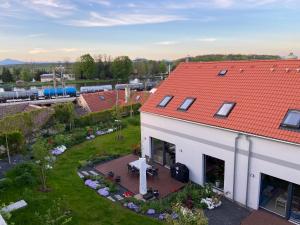 Luxusní dům s rozkvetlou zahradou v centru Roudnice nad Labem