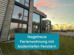 Meerglück am Beltblick Fehmarn - FeWo mit Sauna, Blick auf Ostsee und Leuchtturm, nur 150 m zum Meer