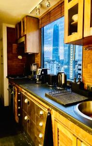 Excellent location and views Spacious 1 bedroom apartment with a sofa bed just steps from Costanera Center it features air conditioning and Wi-Fi and is situated between the El Golf and Tobalaba metro stations Free parking included