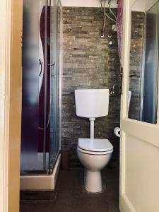 "Little Sicilian Home"-room with a private bathroom & kitchen -fridge - and shared a beautiful terrace on Hostel Taormina Center