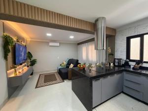 Casa confortável no Centro, tudo completo