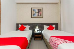 Capital O 91277 Nur Villa Hotel