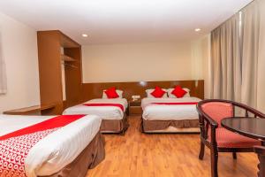 Capital O 91277 Nur Villa Hotel