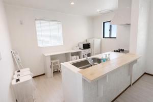 Seaside villa 5minChuraumi Near JUNGLIA 6pax Free P WiFi