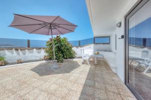 Bungalow Olas del Risco - Ocean views - Beach 2 min By Lanzarote Vacation Homes