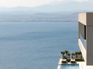 Seafront Cliff Villa with Infinity Pool & Wellness, By ThinkVilla