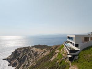 Seafront Cliff Villa with Infinity Pool & Wellness, By ThinkVilla