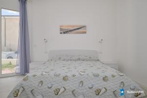 Villino nuovo con giardino a soli 450m dalla spiaggia di Porto Ottiolu