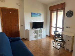Casa COMER GRISOLIA