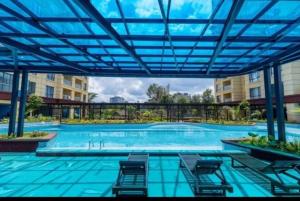Elegant 1BR at Alba Gardens,Steps from Yaya Centre