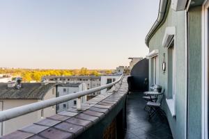 Stary Browar Two-Level Apartment by BookingHost