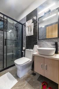luxury elegant furnished three bedroom apartment with children playing ground,swimming pool relaxing rooftop with amazing city views, ample parking space and proximity to major shopping malls