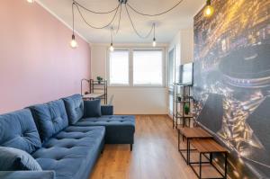 Spodek Light Apartment by BookingHost