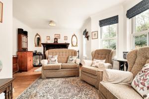 Spacious 3BR Home with Private Garden & Parking