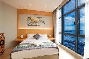 The Voyagers Home I The Shore CBD KK I 2 rooms 2-4 pax