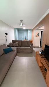 Apartamento 100 metros da Praia Grande - Caiçara