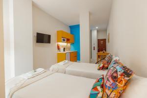 Colorful Studios Municipal Pool by Vacationy