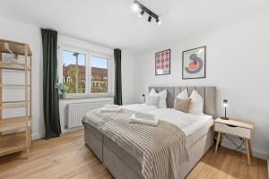 LudwigsCozyEscape - Helles Design-Apartment am Residenzschloss, 6 Gäste, SmartTV in jedem Zimmer, Highspeed WLAN, Workspace, 24h Self Check-in, Parkplatz 2 Min