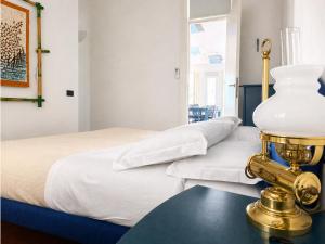 Lassù - Appartamento sulla piazza vista mare