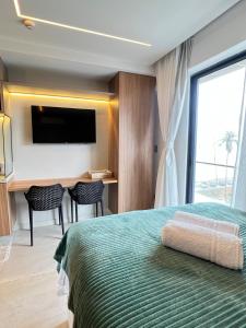 Flat incrível com vista mar de tirar o fôlego - com hidro aquecida