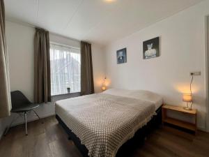 OV790 - Comfortabel 10-persoons vakantiehuis aan het water met eigen aanlegsteiger nabij Giethoorn