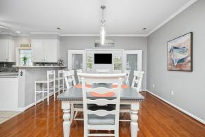 Stuck in Parrotdise by Oak Island Accommodations