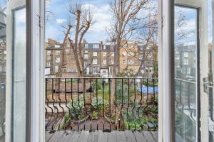 Notting Hill Neighbour - 2BR Designer Stay by REGAL REALMS