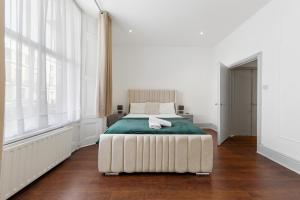 Notting Hill Neighbour - 2BR Designer Stay by REGAL REALMS