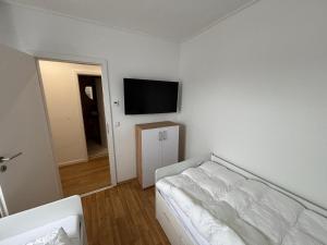 Ferienhaus-Wellenperle