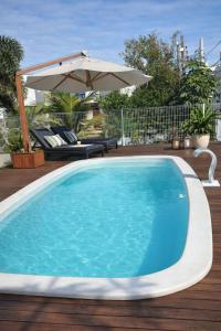 Casa com Piscina próxima ao Mar em Florianópolis