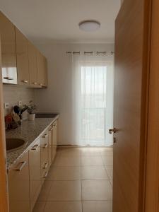 Spacious 2BR Apartment with Balcony & City View