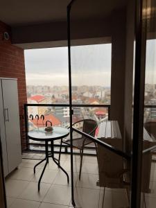 Spacious 2BR Apartment with Balcony & City View