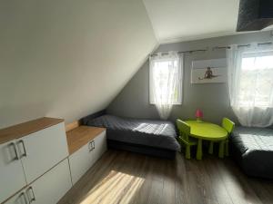 Holiday home with a garden, right by the lake