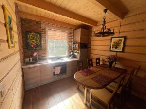 Holiday home with a garden, right by the lake