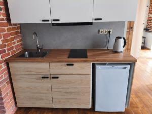 Studija Kurpiu svetingumas