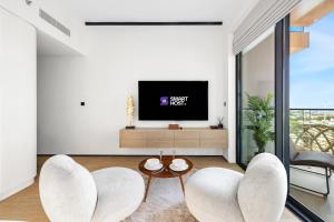 Modern Studio with Balcony & Pool at Rise Residences in JVC