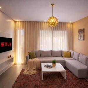 New Berber Chic Apartment! 3mn Walk to Beach, Private Balcony, Shared Rooftop, Free Parking & Remote Desk