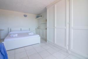 GuestHost - Cozy Open-Plan Apartment in Sardinia