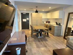 Modern Beachside Condo with Rooftop Pool