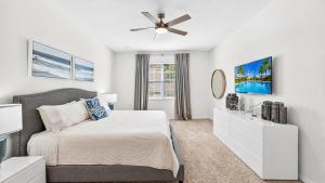 Spacious, lakefront home with a lanai, private pool, spa, & washerdryer