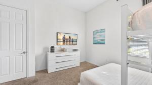 Spacious, lakefront home with a lanai, private pool, spa, & washerdryer