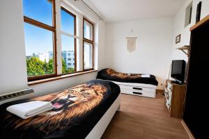 Apartament z sypialnią w szafie Narnia Sopot by MC Apart