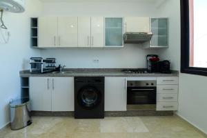 Élégant Appartement 2 Chambres avec Piscine - Guéliz, La maison du regard