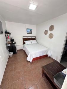 Habitaciones Playa Surf City Aire WiFi y Parqueo