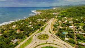 Habitaciones Playa Surf City Aire WiFi y Parqueo