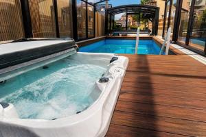 Apartment in Mi dzywodzie with a swimming pool