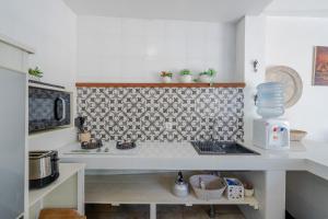 Peacock Bungalow by Pertama Stay