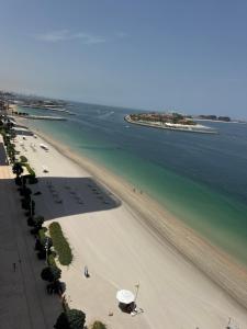 Luxury 1BR Palm View Private Beach & Pool