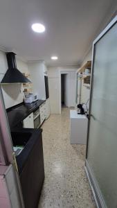 3 bedroom apartment, centrally located, walking distance to beach